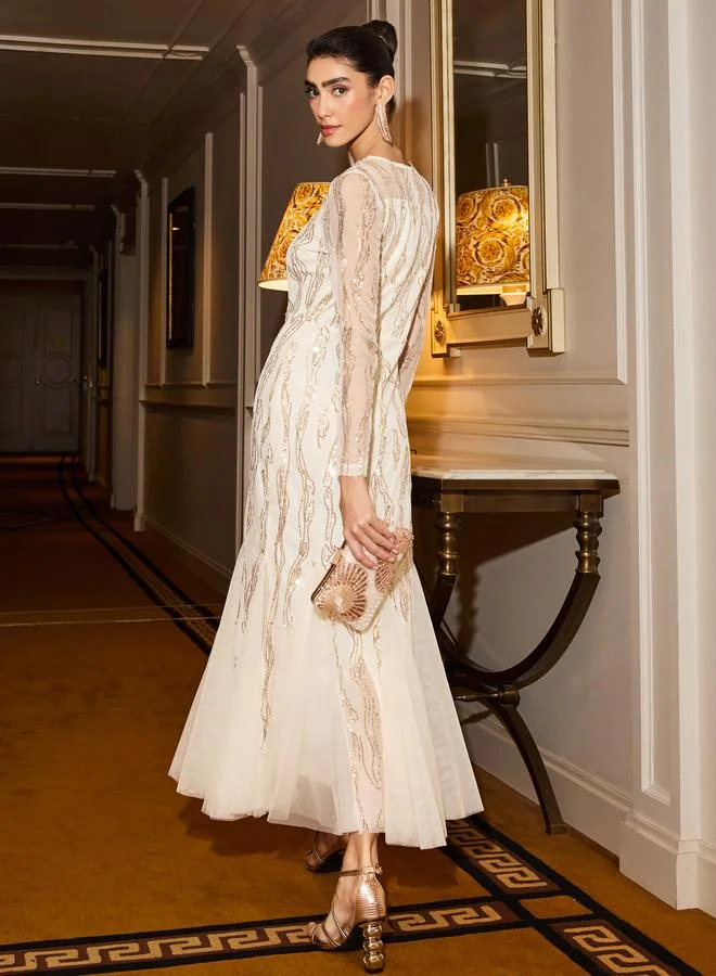 ستايلي فستان طويل من الشبك والترتر