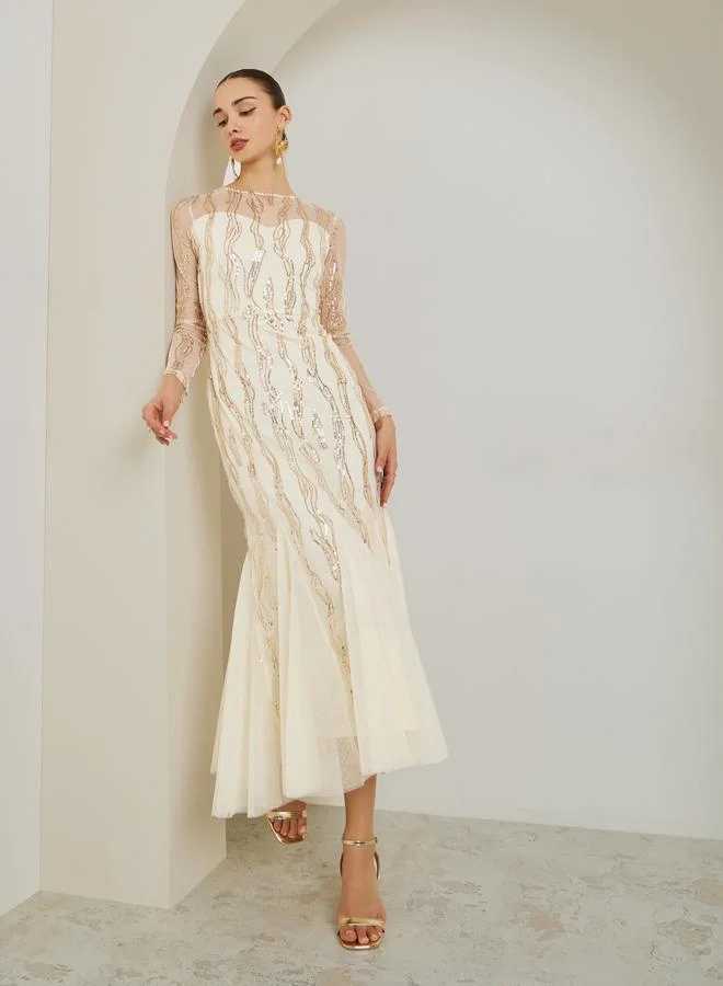 Styli  Cream Sequin Mesh Insert Maxi Dress for Women | Best Price UAE