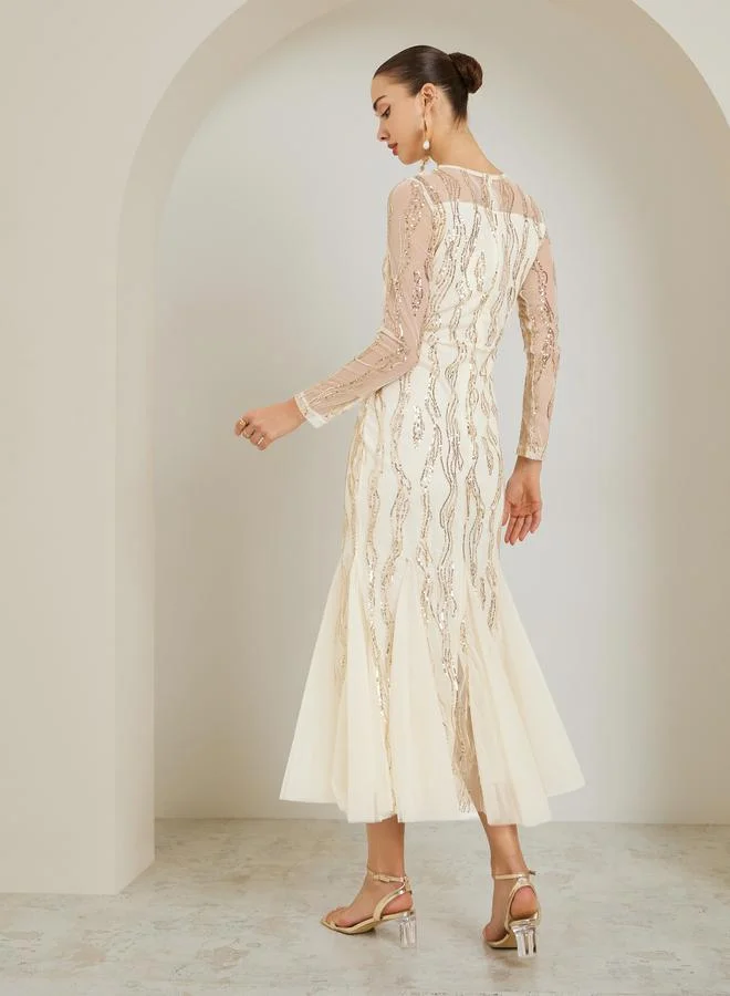 Styli  Cream Sequin Mesh Insert Maxi Dress for Women | Best Price UAE