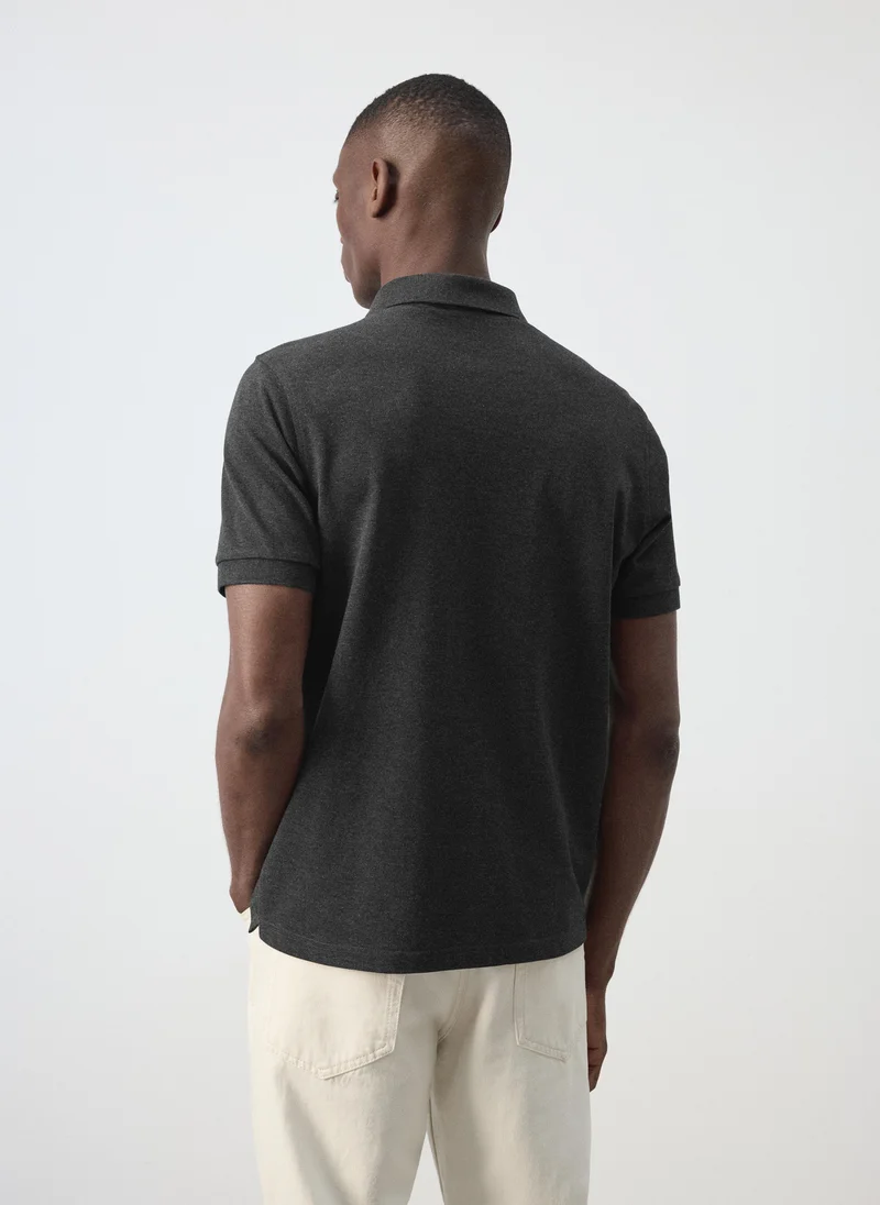 مانجو مان Polo Shirt Rea