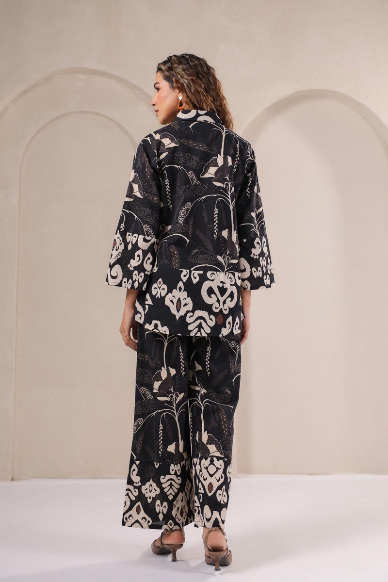 Label Flavia طقم تنسيق أسود مع بلوزة وسروال للنساء - Image 1