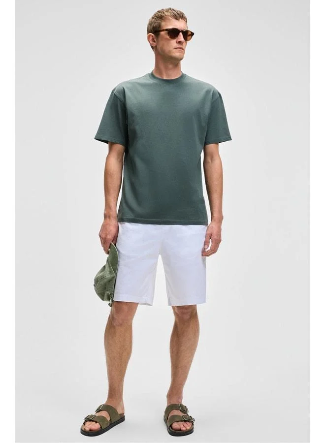Grimelange LASPER Men's elastane Side Pocket Elastic Waist Relaxed Fit White Shorts.