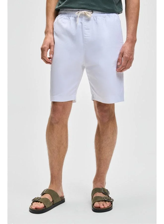 Grimelange LASPER Men's elastane Side Pocket Elastic Waist Relaxed Fit White Shorts.