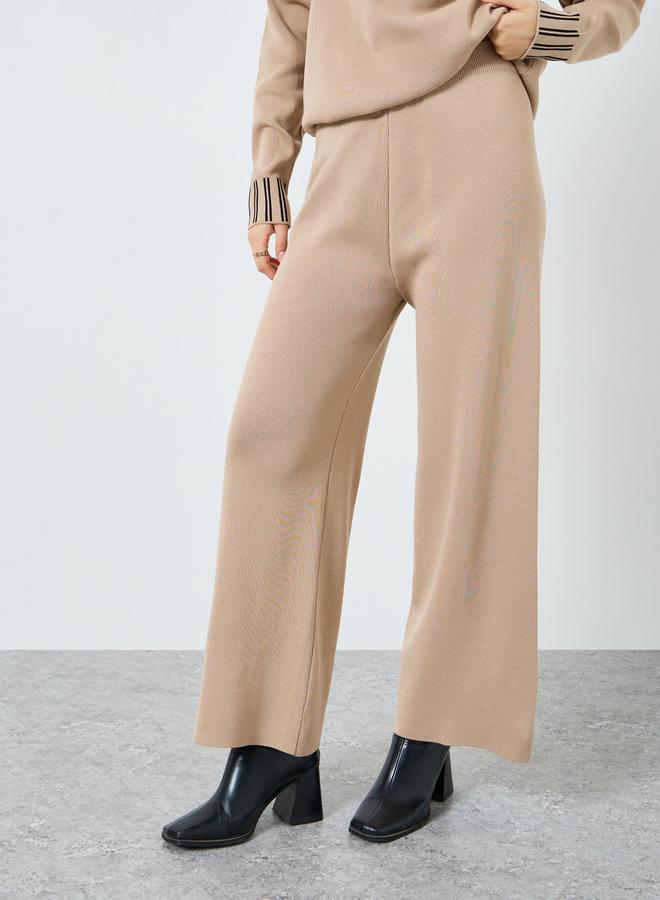 ستايلي طقم سترة بياقة مستديرة وأكمام واسعة وبنطلون واسع بجيوب أمامية مخططة - Image 5