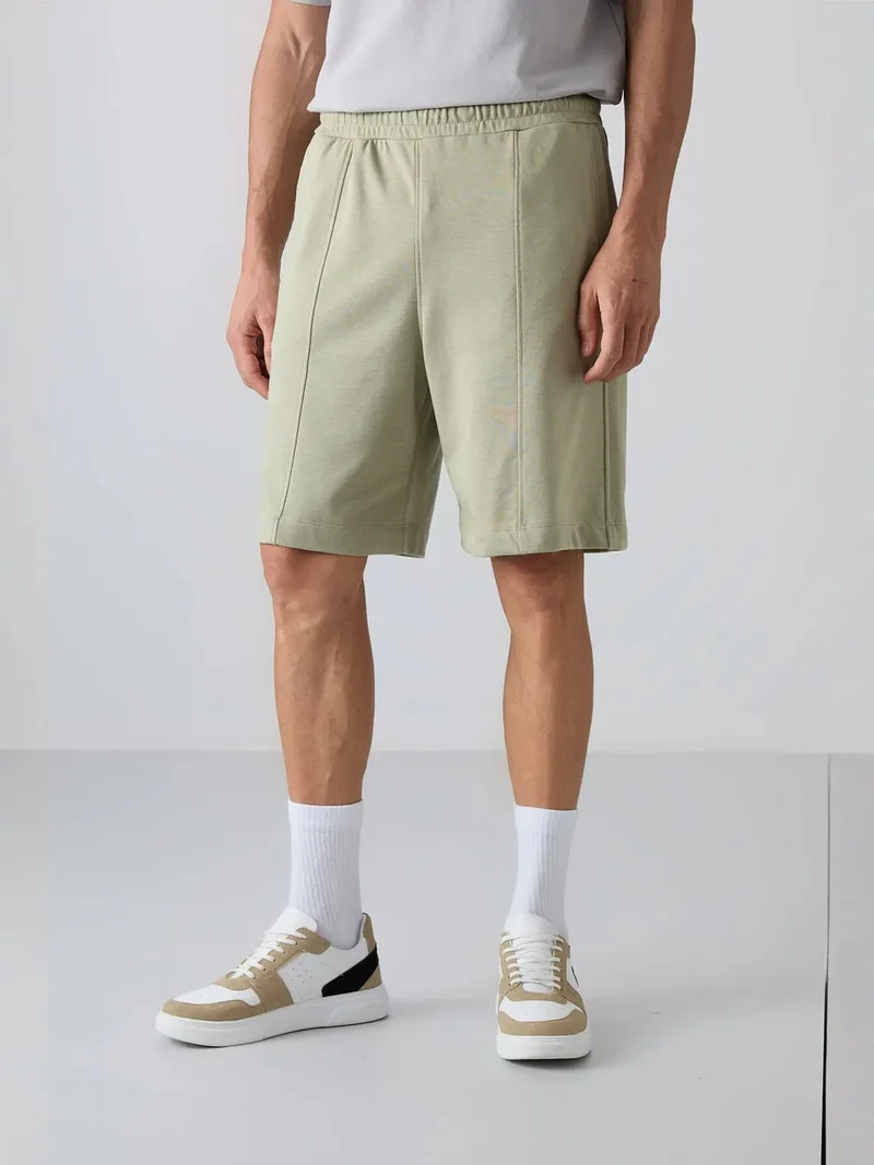تومي لايف TOMMY Men's Knit Sweat Shorts