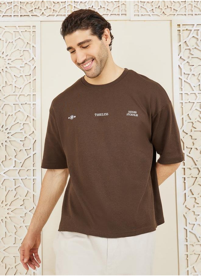Styli Styli Front and Back Graphic Print Interlock Oversized T-Shirt  - Image 1