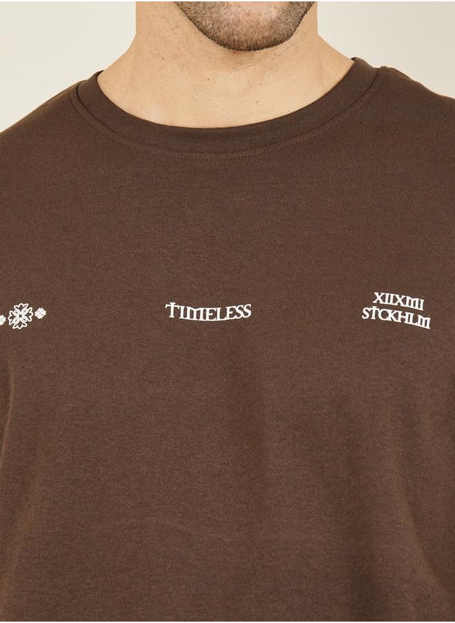 Styli Styli Front and Back Graphic Print Interlock Oversized T-Shirt  - Image 3