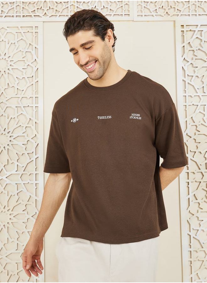 Styli - Front & Back Graphic Print Interlock Oversized T-Shirt - Image 1