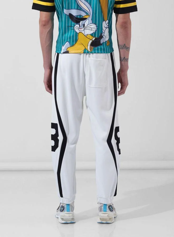 The Indian Garage Co Men Loose Fit Embroidered Side Pocket Mid-Rise Joggers