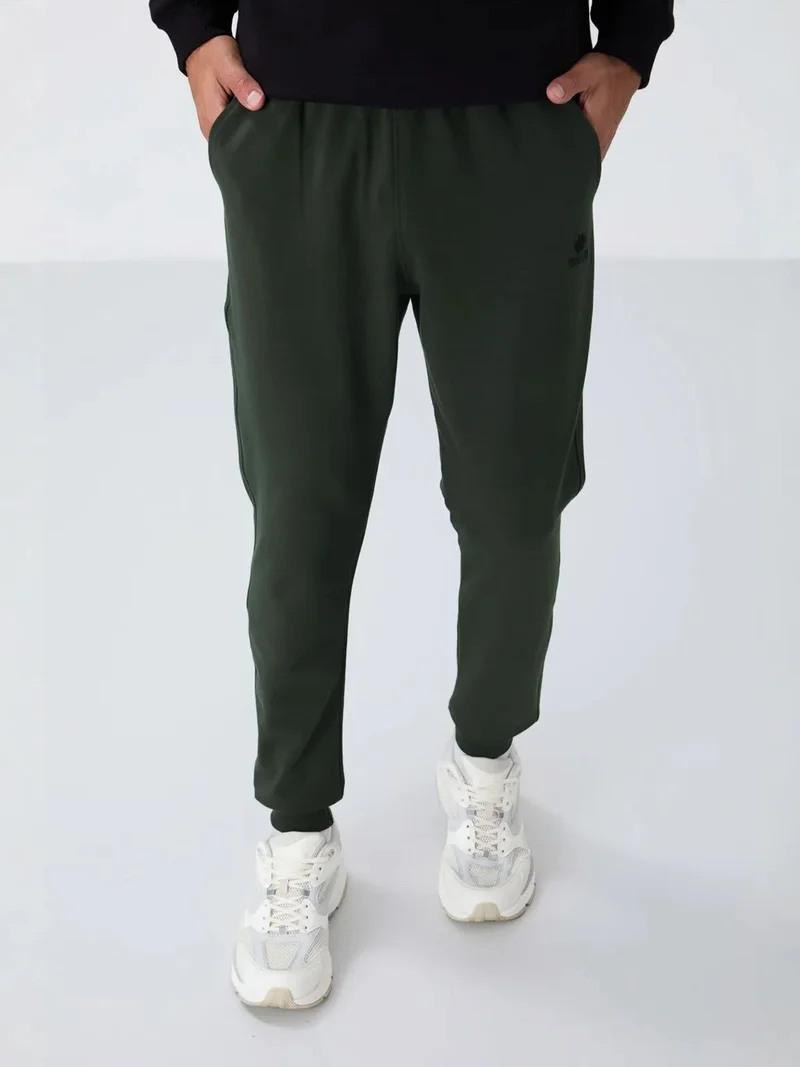 تومي لايف TOMMY Men's Solid Fleece Sweatpants