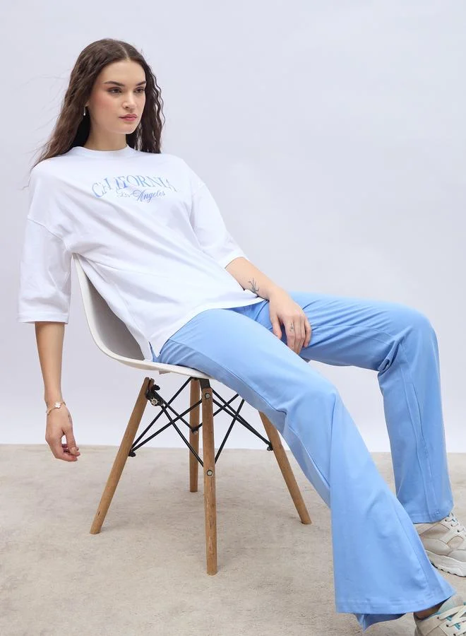 Styli Styli Slogan Print Oversized T-Shirt and Flared Leggings Co-Ords