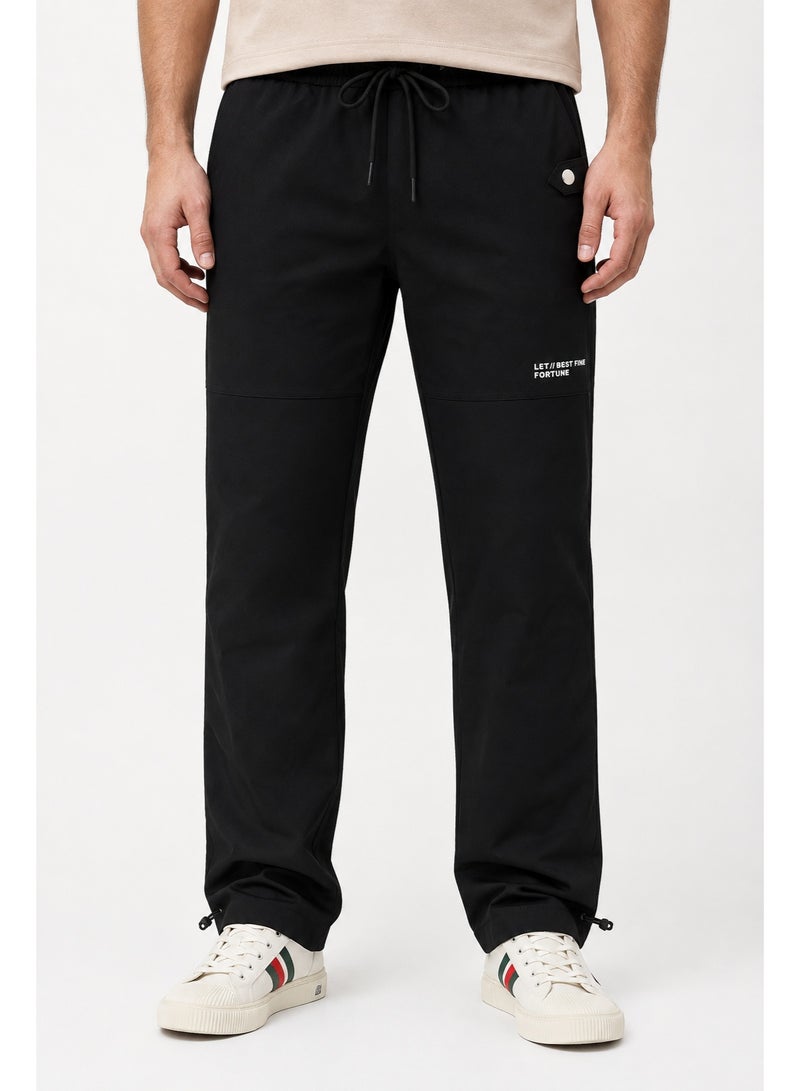 WHITE RABBIT Slip On Plain Black Practical Joggers - Image 1