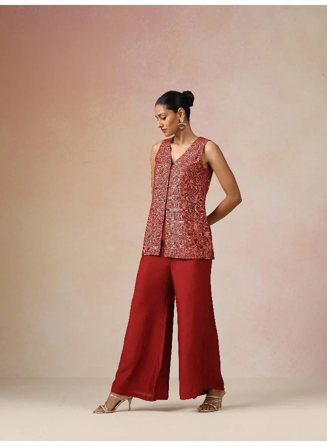 ترو برونز طقم جاكيت وبنطلون واسع بطبعة ذهبية حمراء من