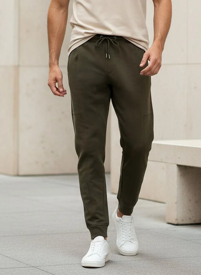 ايكونيك بنطلون رياضي رجالي عصري بقصة ضيقة وجيوب