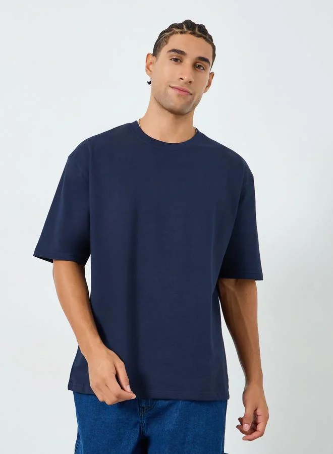 Styli Men Navy Blue Graphic Print Oversized T-Shirt