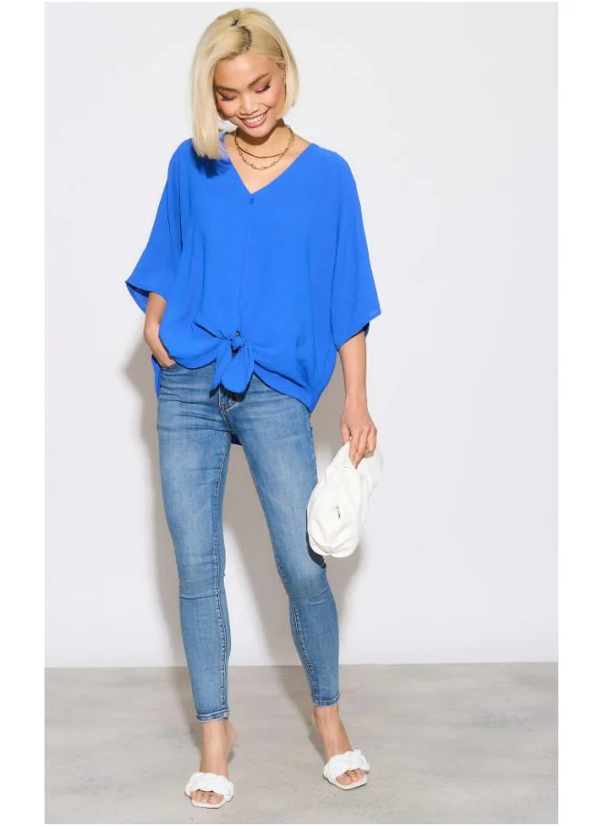 Hoxton Gal Oversized V-Neck Blouse with Tie Front and 3/4 Sleeves in Royal Blue