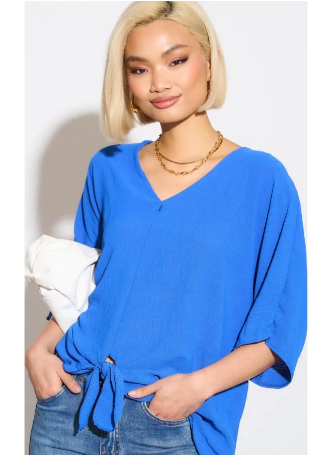 Hoxton Gal Oversized V-Neck Blouse with Tie Front and 3/4 Sleeves in Royal Blue