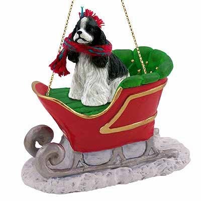 Cocker Spaniel Sleigh Ride Christmas Ornament Black-White - Delightful!