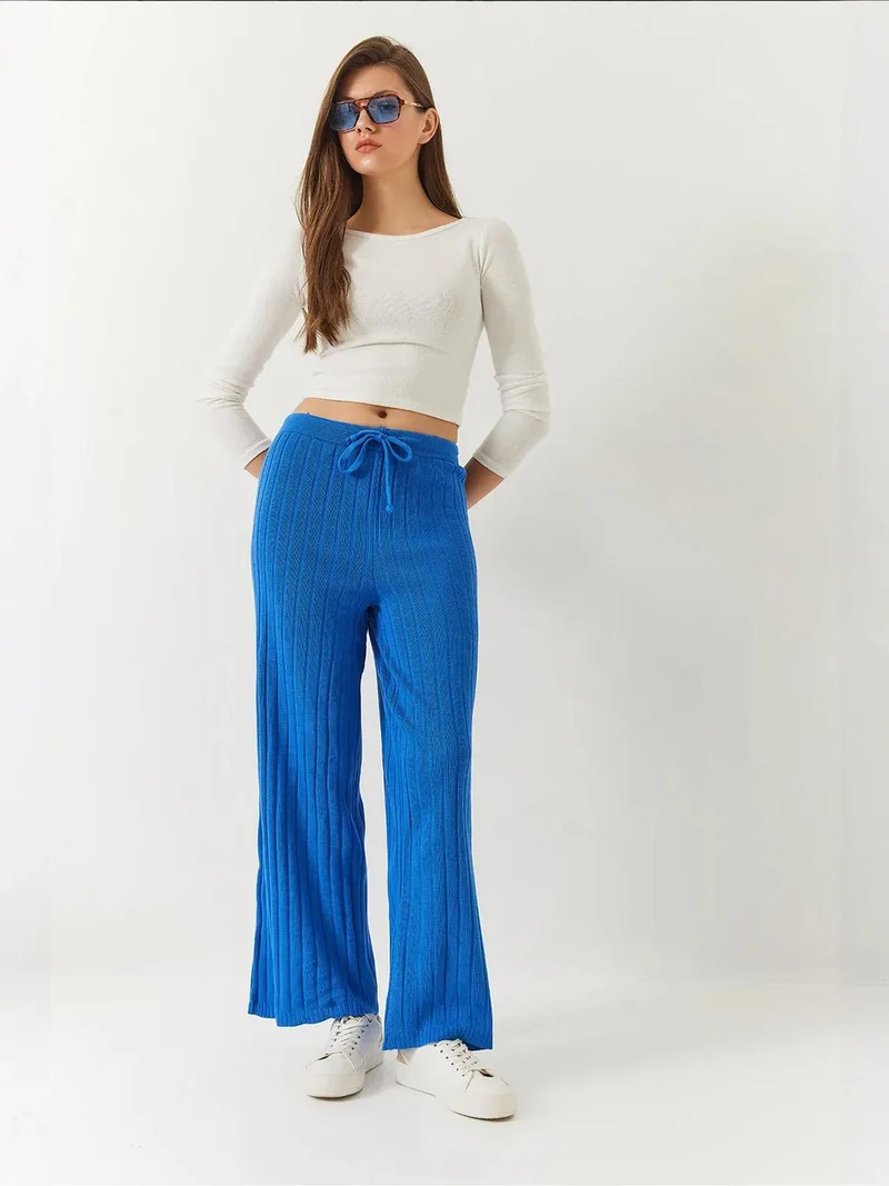 بيانكو لوتشي بنطلون لوكسي بالازو بنقوش مع رباط إغلاق