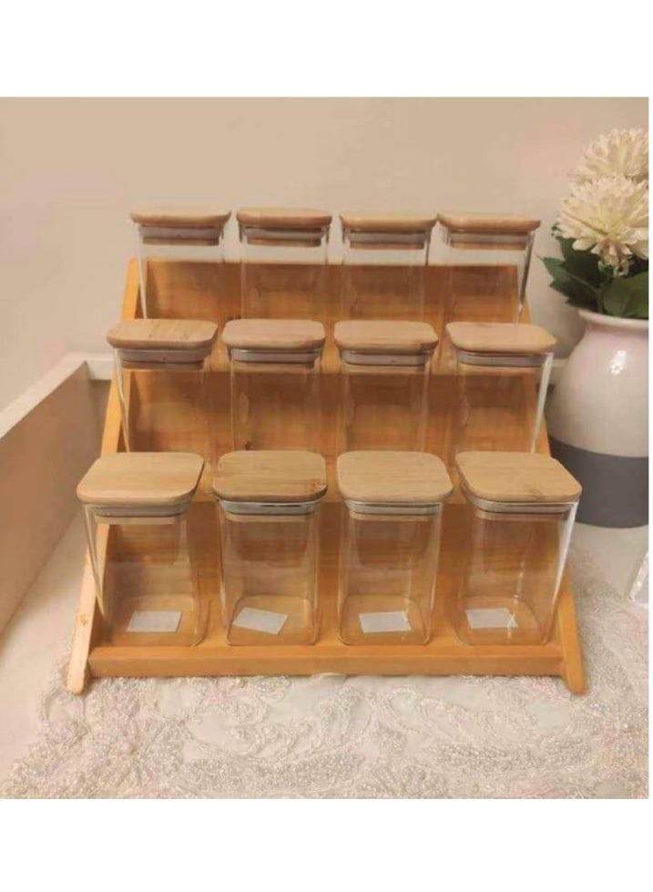 إيباسكت برطمانات توابل مصنوعة من الاكليريك عالي الجودة مكونة من 12 برطمان بسعة 250 مل لتكفي جميع احتياجاتك التخزينية مع غطاء من الخيزران محكم الغلق وحامل خشبي قوي جميع المقاسات متوفرة ومصنوعة من مواد صحية غير ضارة. - Image 1