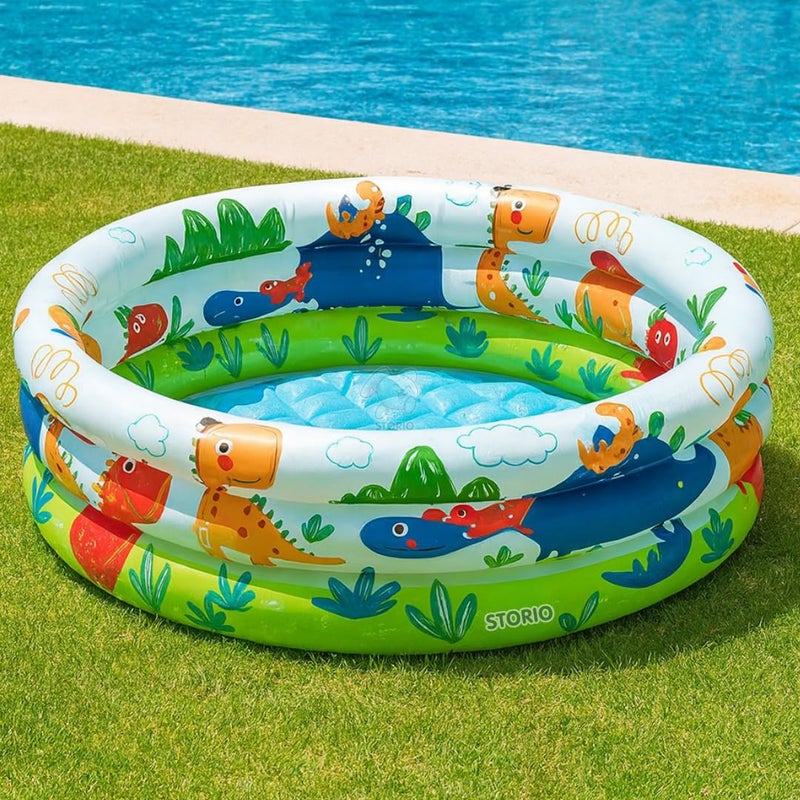 Storio حمام سباحة للأطفال القابل للنفخ بتصميم الديناصورات 3 حلقات – حمام سباحة للأطفال | حوض لعب مائي متعدد الألوان للأطفال الصغار | مدمج، متين وسهل النفخ | للاستخدام الداخلي والخارجي - Image 1