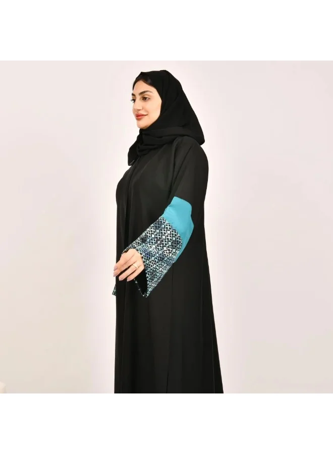 عبايات لمحة عباية لف باللون الاسود مع تداخل الجاكار الزاهي على الاكمام