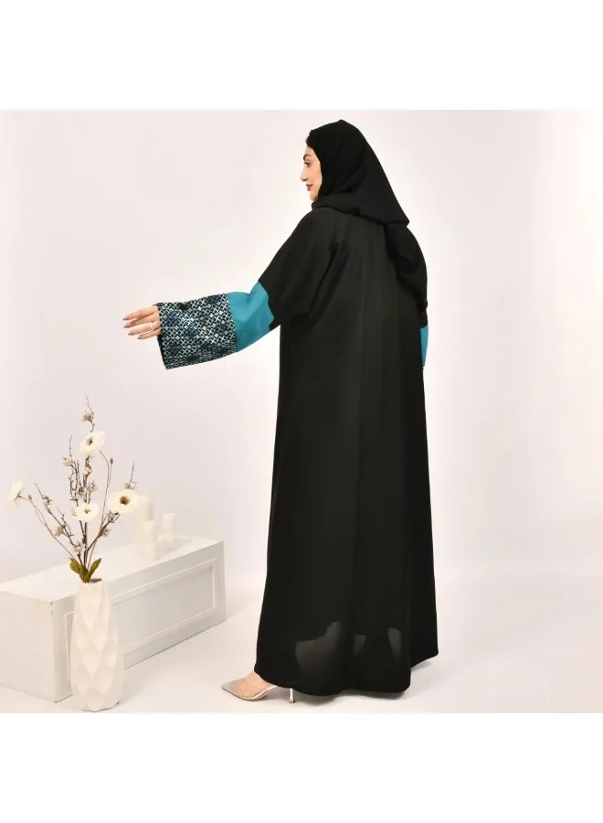 عبايات لمحة عباية لف باللون الاسود مع تداخل الجاكار الزاهي على الاكمام