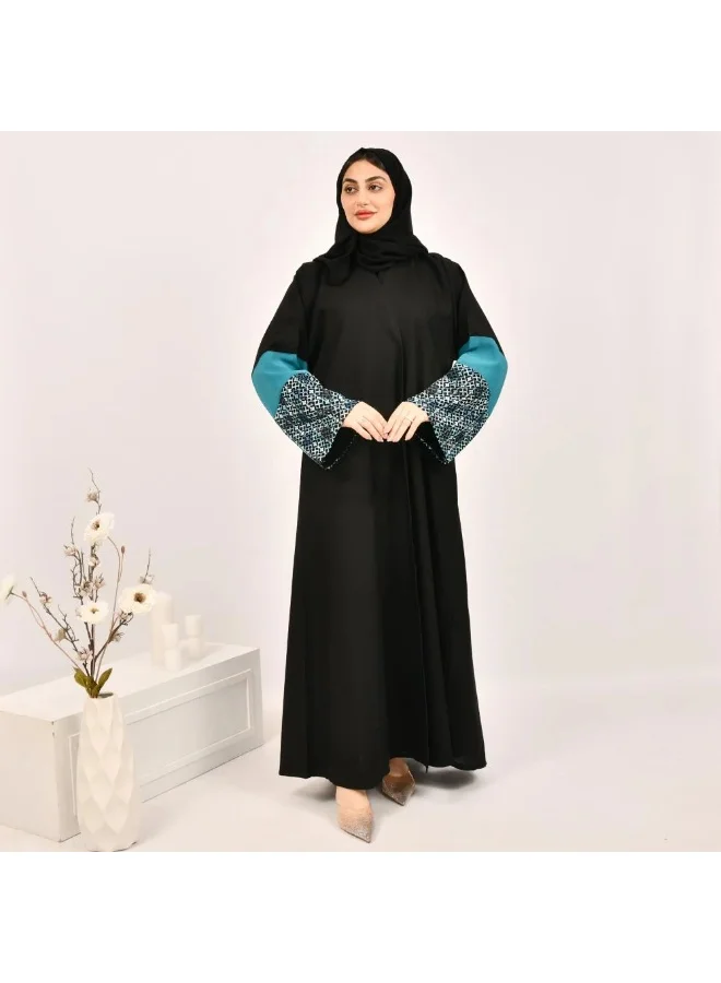 عبايات لمحة عباية لف باللون الاسود مع تداخل الجاكار الزاهي على الاكمام