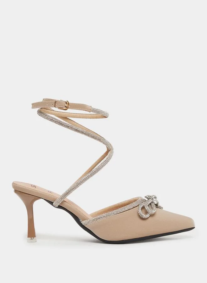سنيك ايه بيك Sneak-a-Peek Beige Rhinestone Embellished Pointed Toe Ankle Strap Pumps