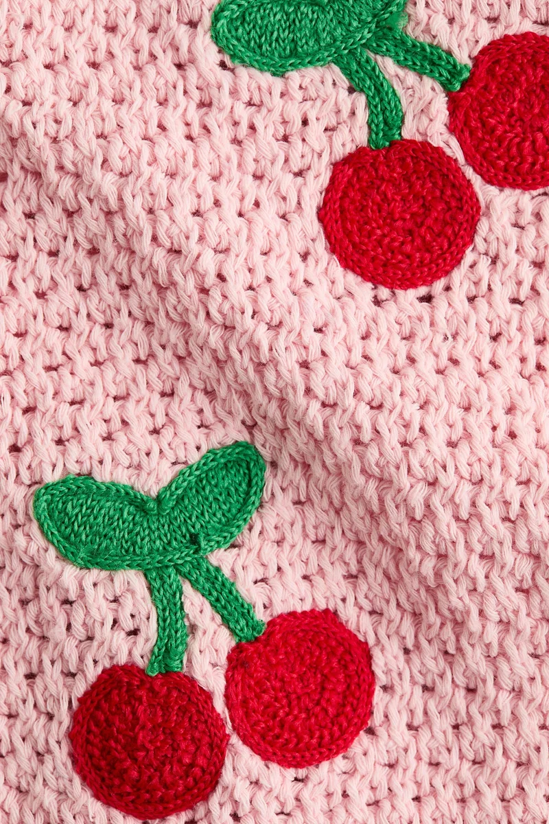 اتش اند ام كنزة محبوكة بفتحات