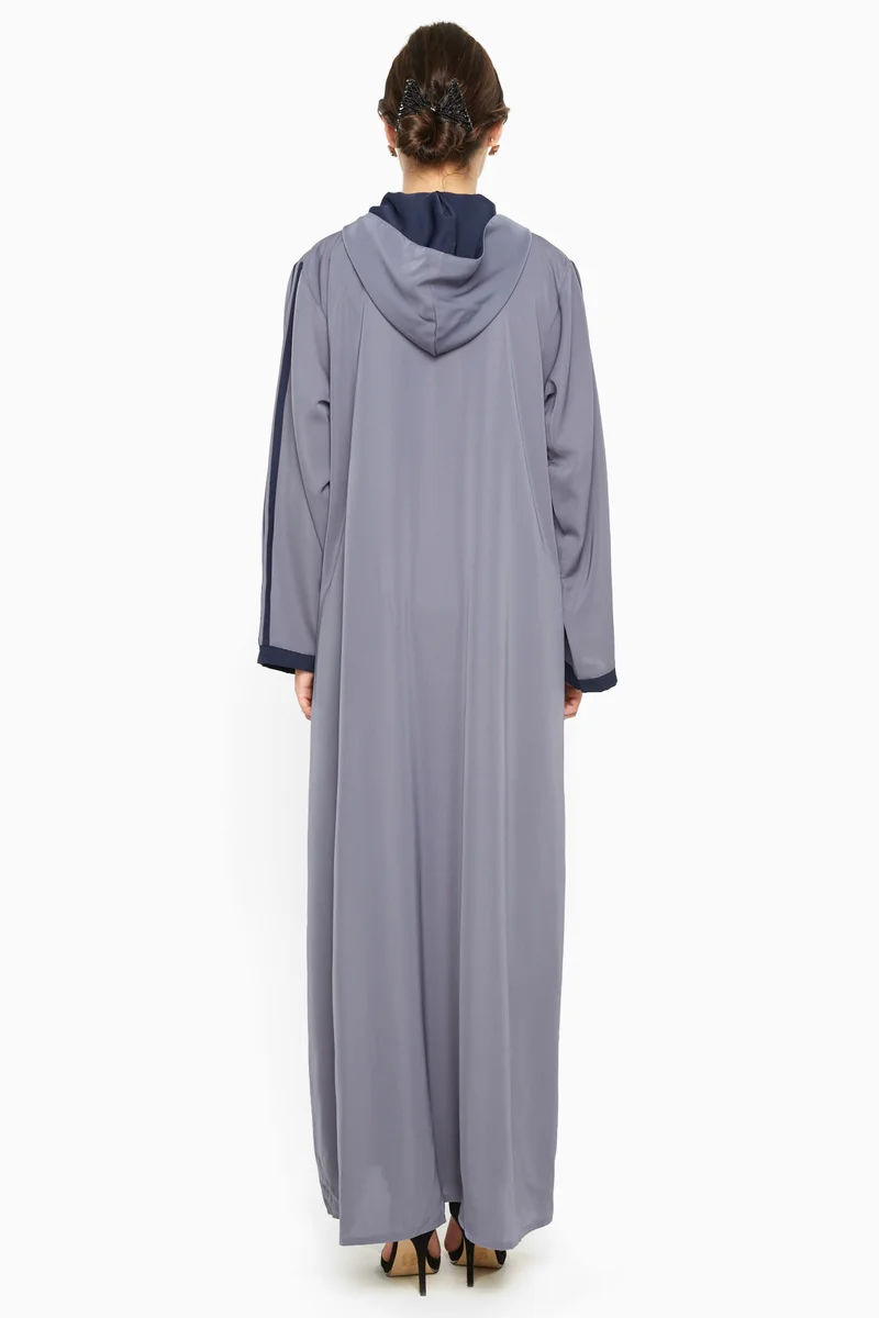 NUKHBAA A casual sporty abaya with a hood and zipped closure with navy blue stripe detail -AJ591A