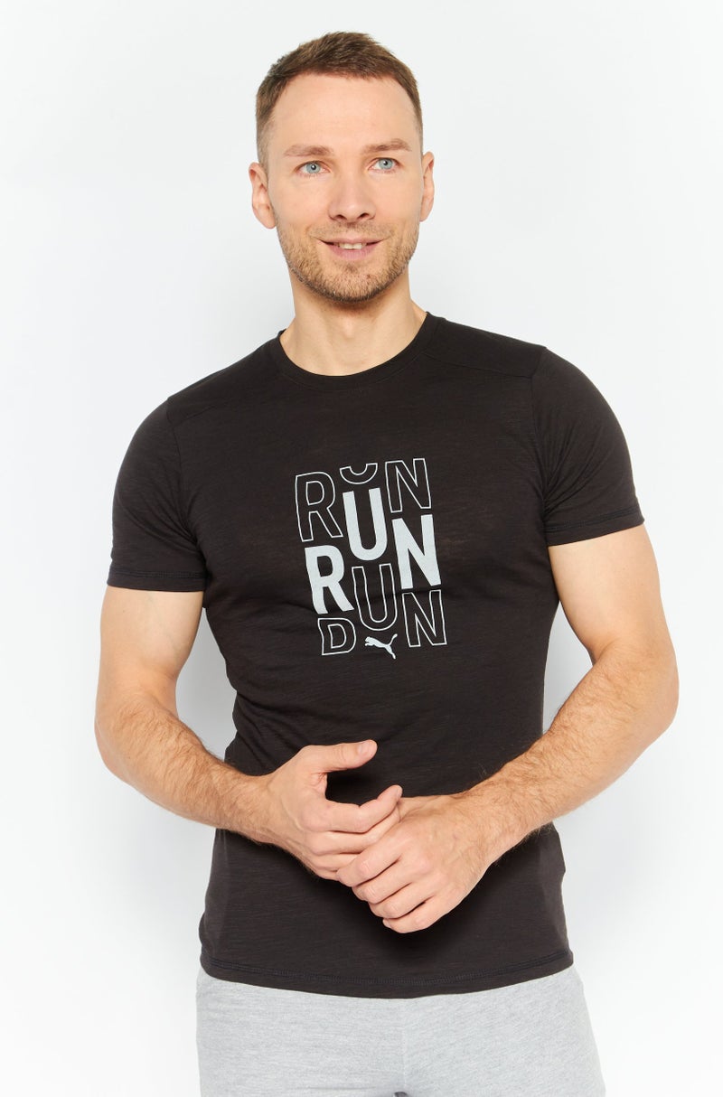 PUMA Men Sportswear Fit Short Sleeves Running T-Shirt, Black - Image 1