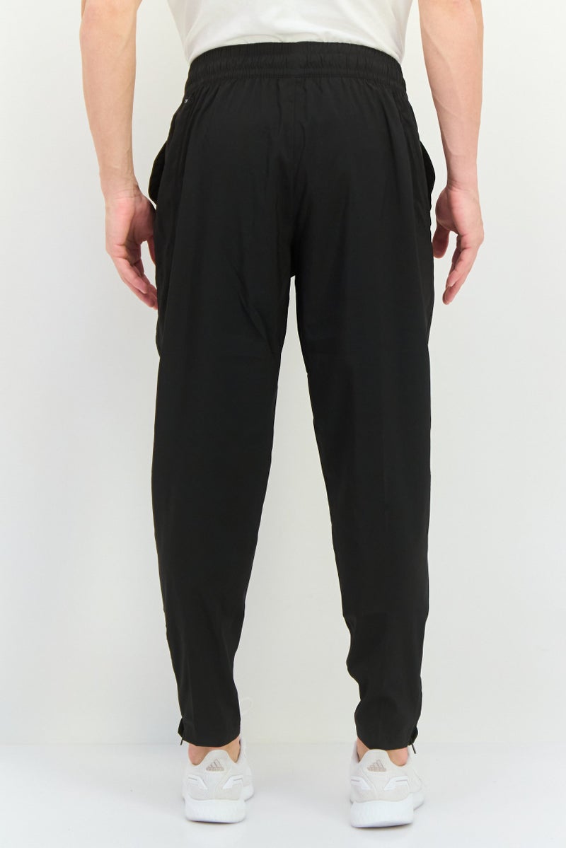 PUMA Men Sportswear Fit Outdoor Track pant, Black - Image 4