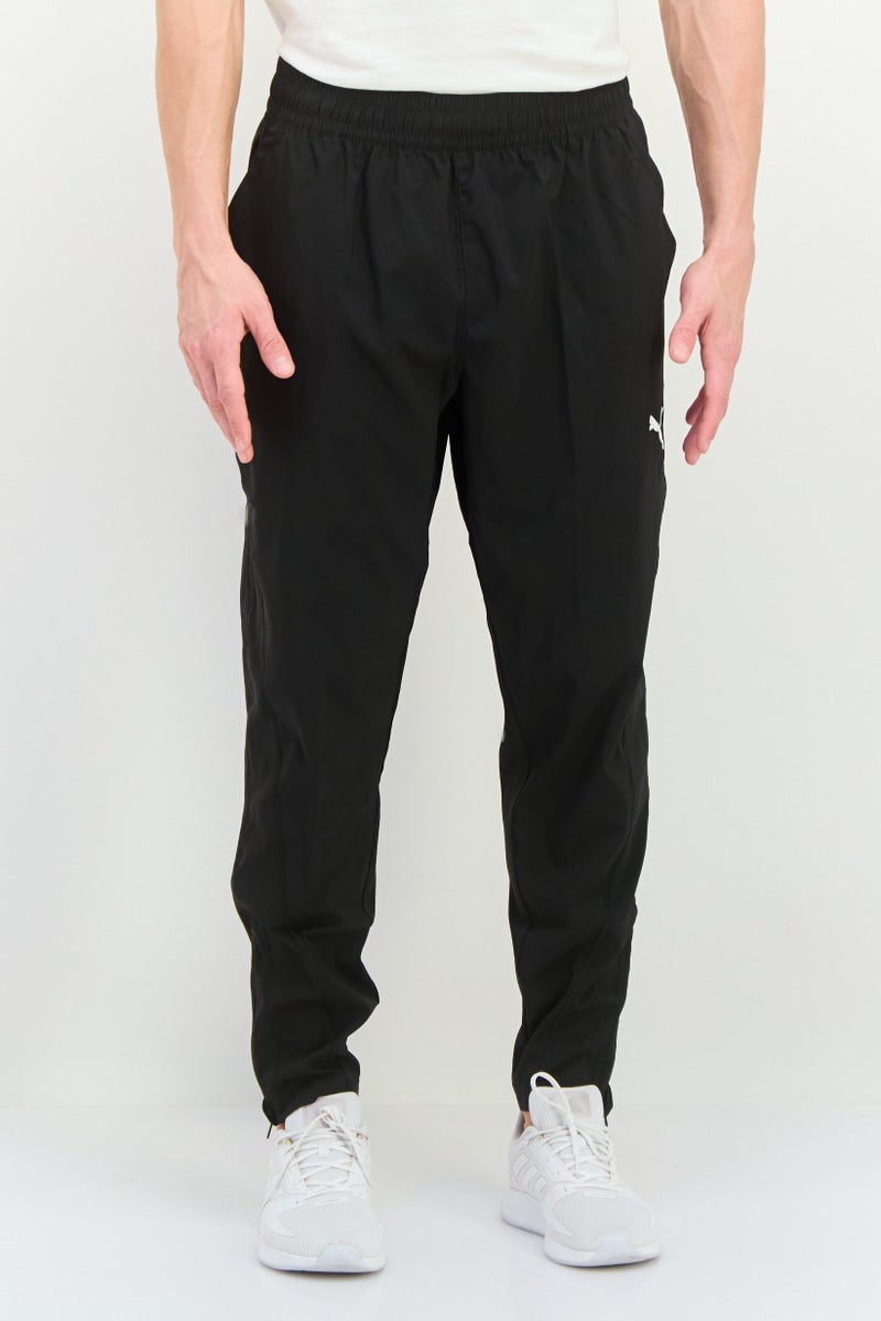 PUMA Men Sportswear Fit Outdoor Track pant, Black - Image 1