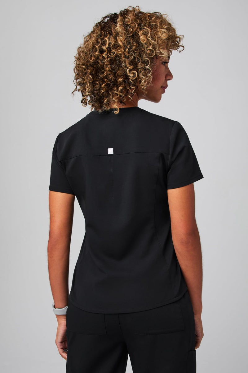 Fabletics Women's Vital 1-Pocket Scrub Top - MotionTech, Wrinkle-Resist, Chest Pocket, Anti-Shrink, Semi-Slim Fit, M, Black - Image 2