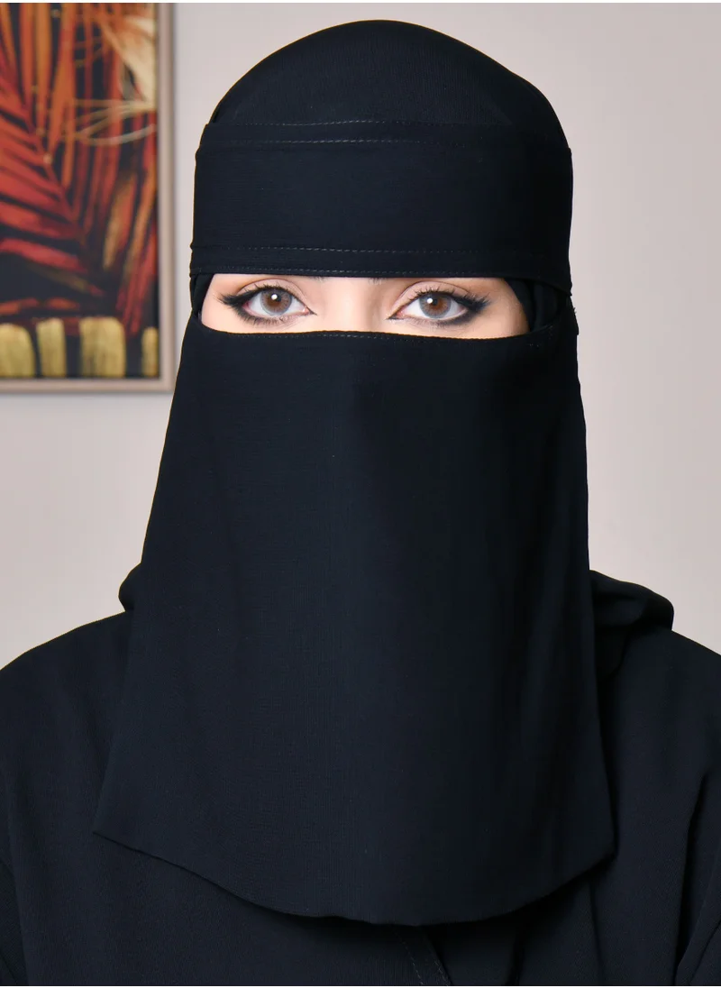 HAWRAA ABAYA A short niqab with one elastic and an adhesive closure