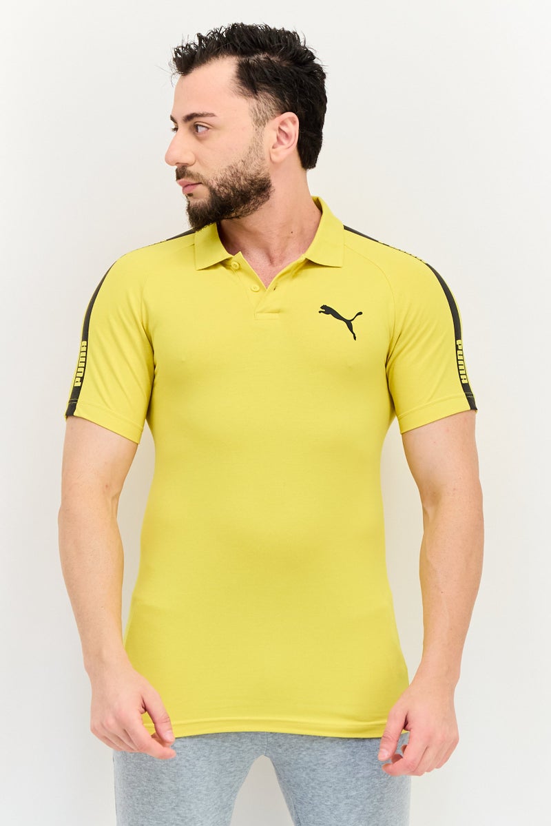 PUMA قمصان بولو قصيرة الأكمام للرجال بتصميم نحيف، أصفر داكن - Image 1
