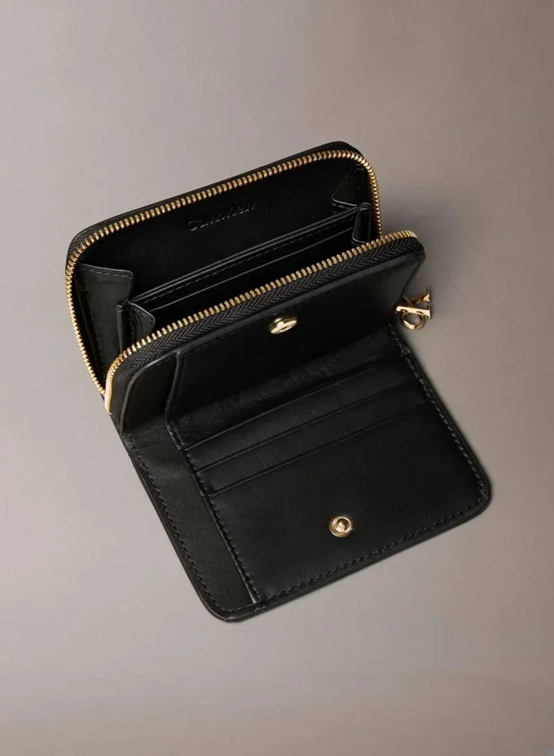 Calvin Klein Black Leather Croc-Effect RFID Zip-Around Wallet for Women | Best Price UAE