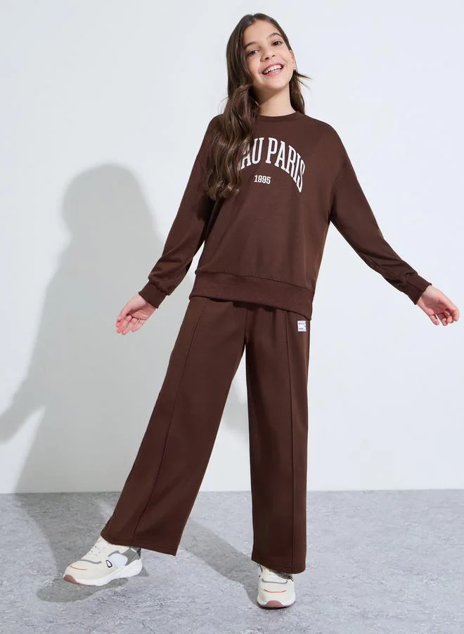 Styli Teen Girls Brown Slogan Print Oversized Sweatshirt and Wide Leg Joggers Set