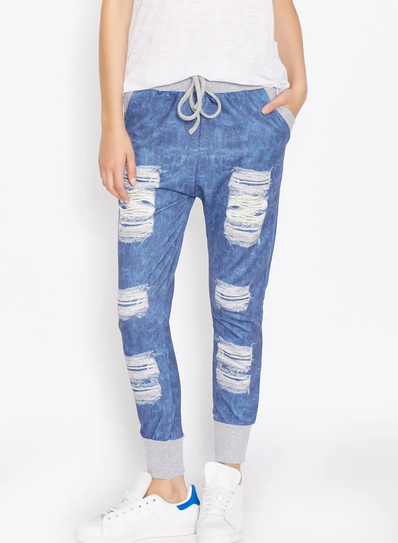 Ginger Ripped Printed Denim Joggers