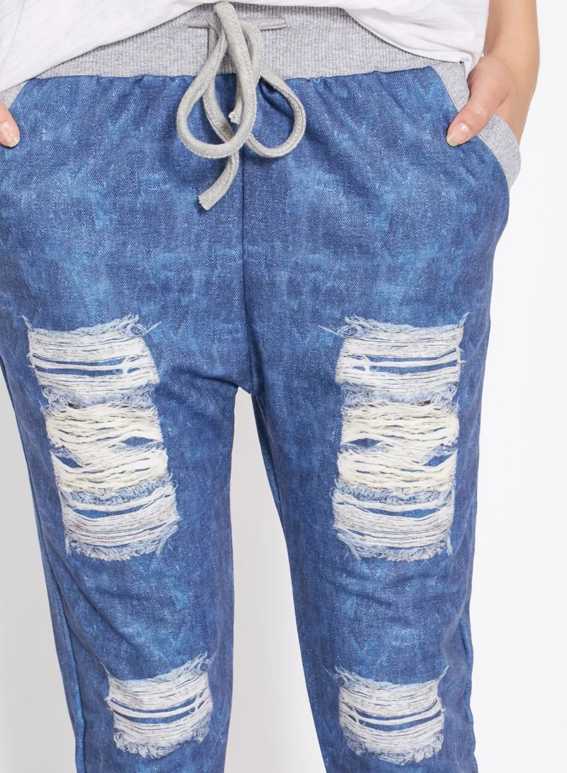 Ginger Ripped Printed Denim Joggers