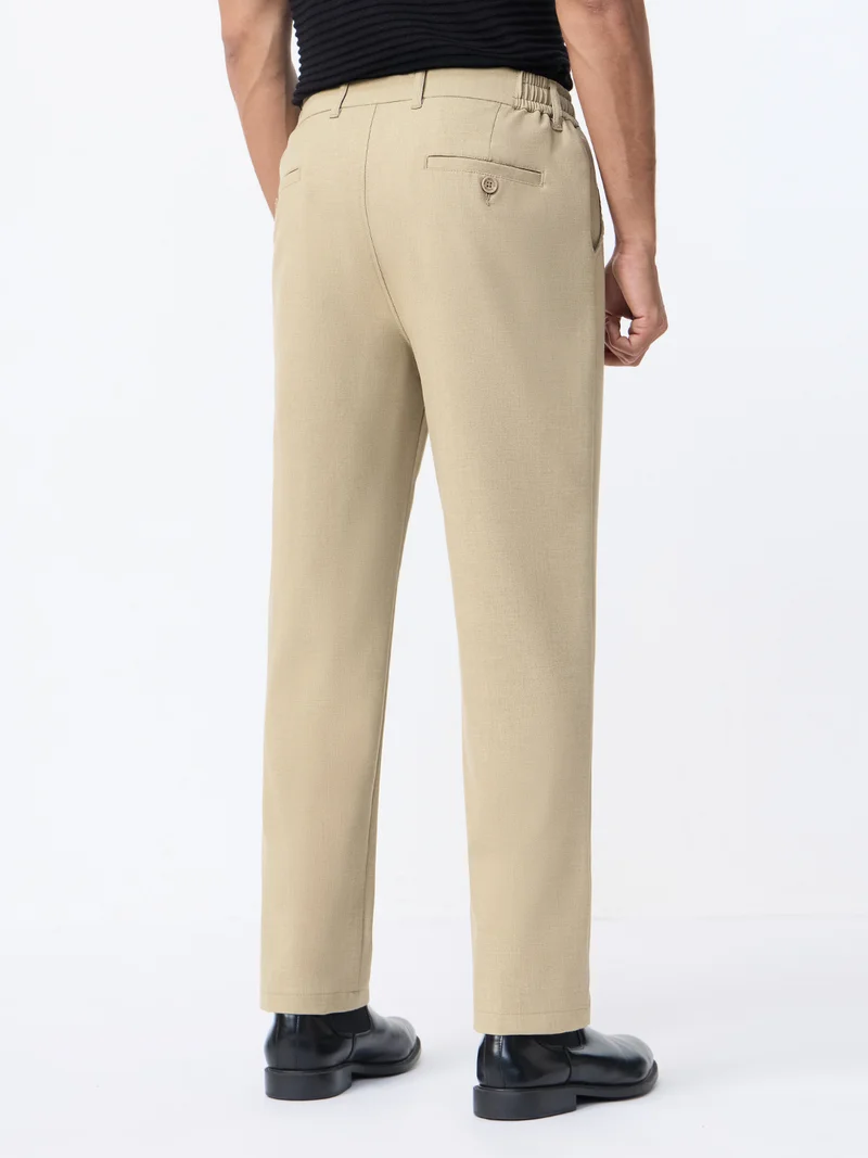 The Souled Store  The Souled Store: Super-Flex Pants Men and Boys Beige Solid Poly-Viscose Blend Straight Fit 4-Way Stretch Wrinkle-Resistant Trousers  | Best Price UAE