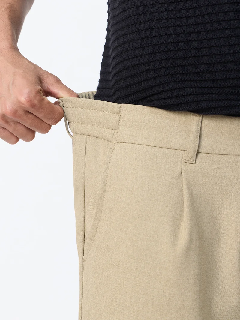 The Souled Store  The Souled Store: Super-Flex Pants Men and Boys Beige Solid Poly-Viscose Blend Straight Fit 4-Way Stretch Wrinkle-Resistant Trousers  | Best Price UAE