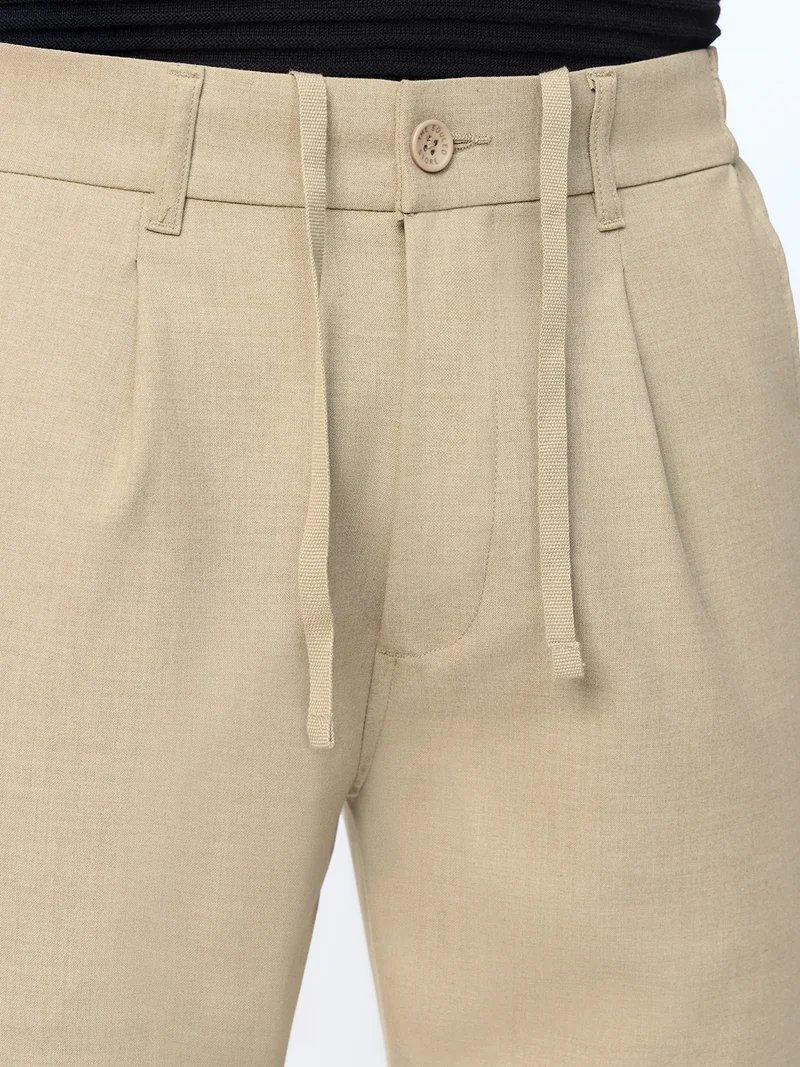 The Souled Store  The Souled Store: Super-Flex Pants Men and Boys Beige Solid Poly-Viscose Blend Straight Fit 4-Way Stretch Wrinkle-Resistant Trousers  | Best Price UAE