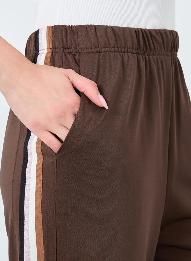 Take Two  Take Two Side Striped Loose Fit Joggers for Women | Best Price UAE