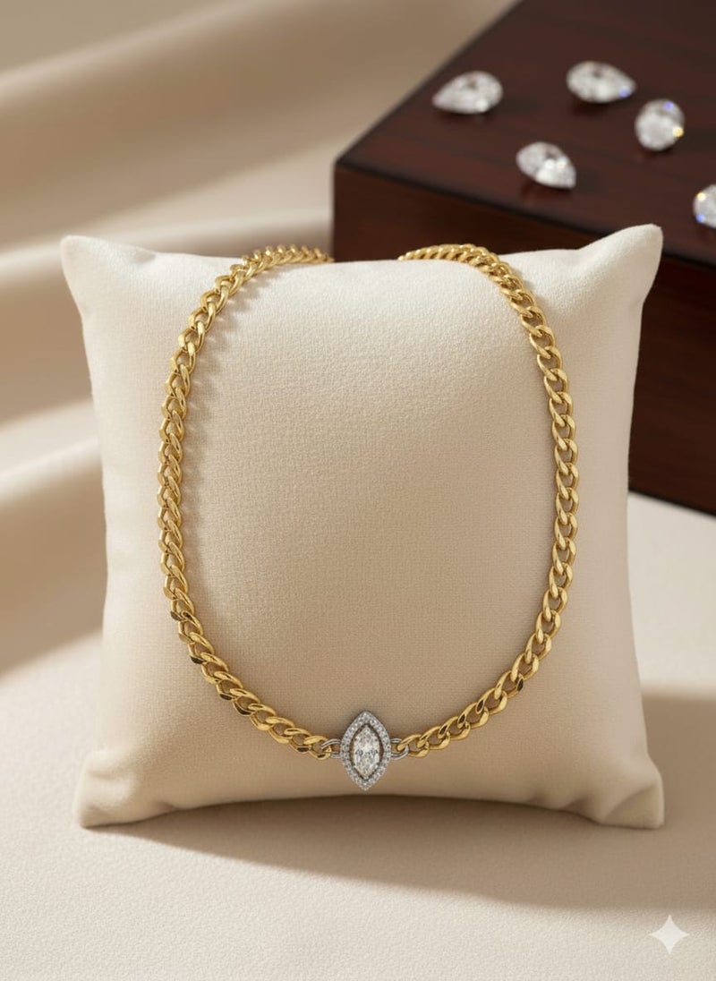 A necklace with a wide gold-plated chain, featuring a small oval silver-tone pendant and smaller sparkling stones. Additional links allow for size adjustment. - Image 2