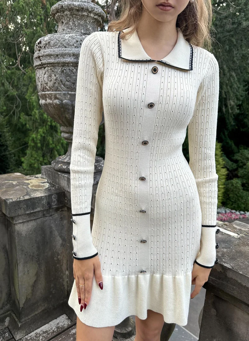 Fitted textured jersey mini dress with skirt flounce