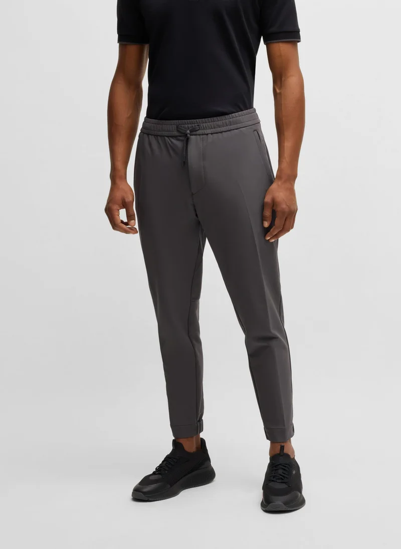 بوس Tapered-fit trousers in water-repellent stretch fabric