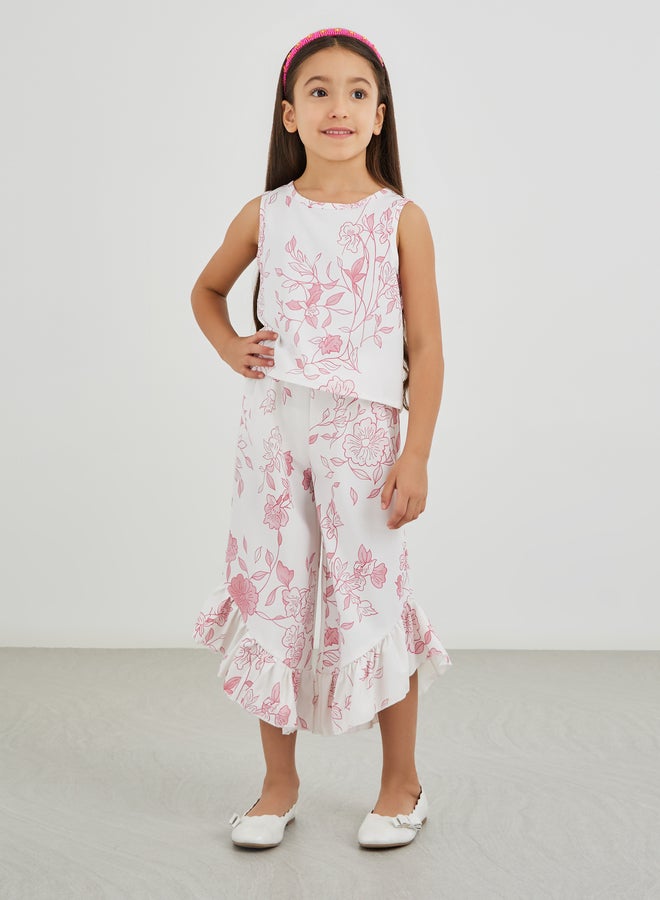 ستايلي طقم بلوزة بناتي بطبعات زهور وكشكشة مع بنطلون واسع بحافة غير متماثلة - Image 2