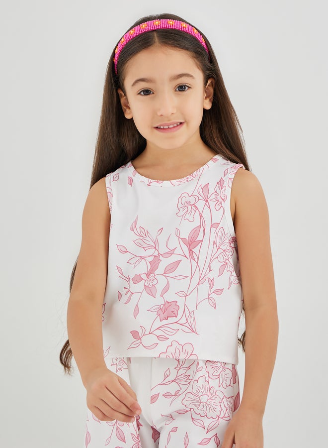 ستايلي طقم بلوزة بناتي بطبعات زهور وكشكشة مع بنطلون واسع بحافة غير متماثلة - Image 3